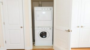 laundry closet with washer and dryer at park vista apartments in congress heights washington dc