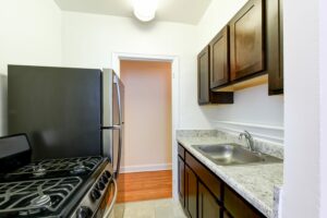 kitchen with refrigerator and gas range at 3101 pennsylvania apartments in randle highlands washington dc