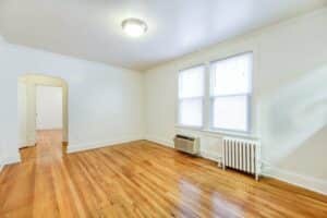 living area with wood floors and large windows at 3213 Wisconsin apartments in cleveland park washington dc