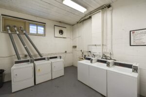 laundry room at alpha house apartments in columbia heights washington dc