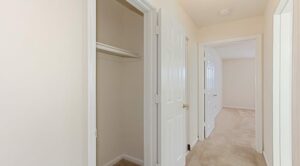 hallway view of closet and bedrooms at grandview village apartments in shipley terrace washington dc