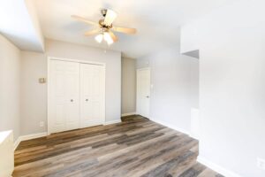 bedroom with wood flooring and ceiling fan at hilltop house apartments in columbia heights washington dc