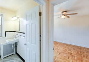 hallway view of bathroom and living area at meridian park apartments in columbia heights nw washington dc