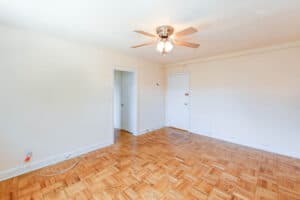 living area with hardwood floors and ceiling fan at meridian park apartments in columbia heights nw washington dc
