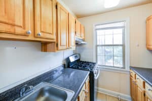 kitchen with gas range and window at meridian park apartments in columbia heights nw washington dc