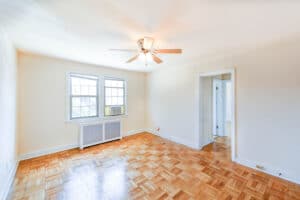bedroom with wood floors and ceiling fan at meridian park apartments in columbia heights nw washington dc