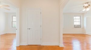 open layout of apartment with wood floors and ceiling fans at parkside apartments in adams morgan washington dc