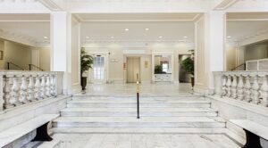 lobby lounge with stairs to elevators at the norwood apartments in washington dc