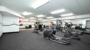 fitness center with cardio machines and exercise balls at washington view apartments in washington dc