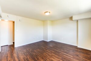 vacant living area with hardwood floors at longfellow apartments in brightwood washington dc