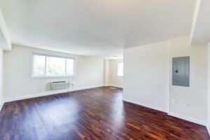 open layout of apartment showing living and dining areas at longfellow apartments in brightwood washington dc