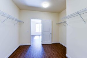 huge walk in closet with shelving at archer park apartments in congress heights washington dc