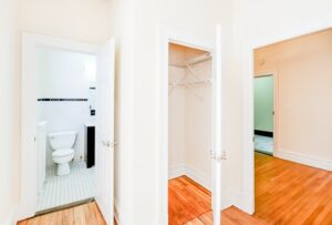 hallway view of closet and bathroom at chatham courts apartments in adams morgan washington dc