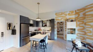 open layout showing living area, and kitchen at avec on h luxury apartments in washington dc