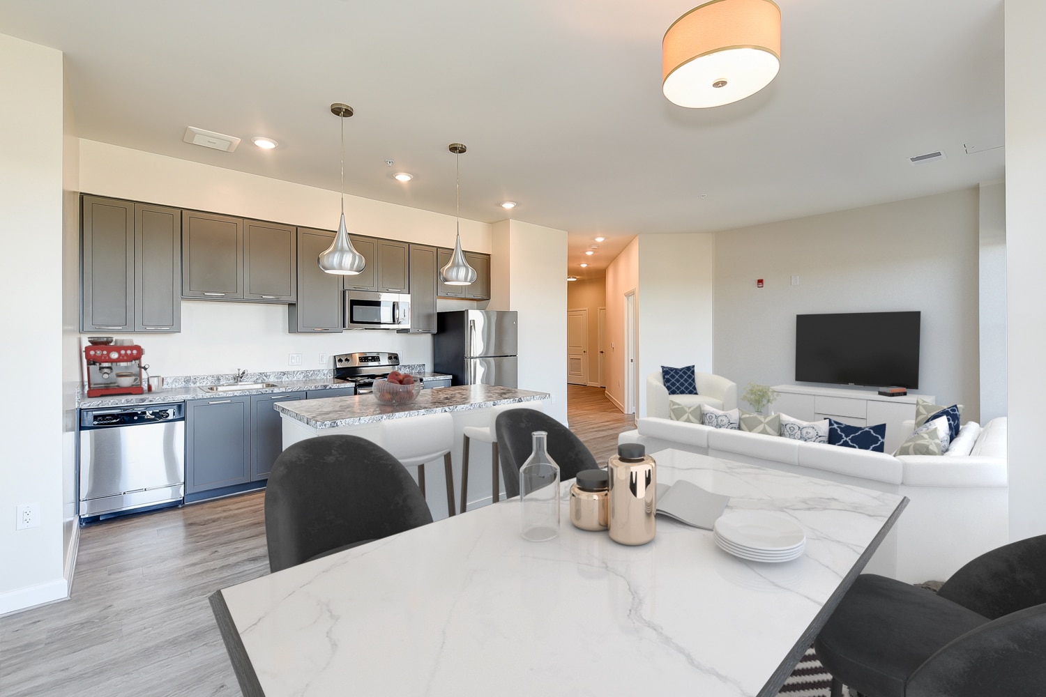 open layout showing living area, dining area and kitchen at city view apartments in washington dc