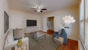 living area with hardwood floors and ceiling fan at 2801 Pennsylvania apartments in randle highlands washington dc