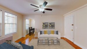living area with wood flooring and ceiling fan at 2801 pennsylvania apartments in randle highlands washington dc