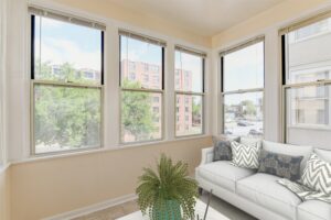 sun room with tile floors and large windows at twin oaks apartments in petworth washington dc