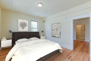 bedroom with wood floors at twin oaks apartments in petworth washington dc