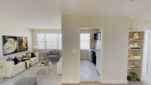 open layout of apartment showing living area, kitchen and hallway at jetu apartments in carver langston washington dc