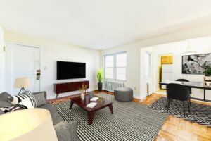 open layout of apartment showing living area, dining area and kitchen at richman apartments in congress heights washington dc