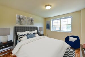 bedroom with windows and wood floors at shipley park apartments in washington dc