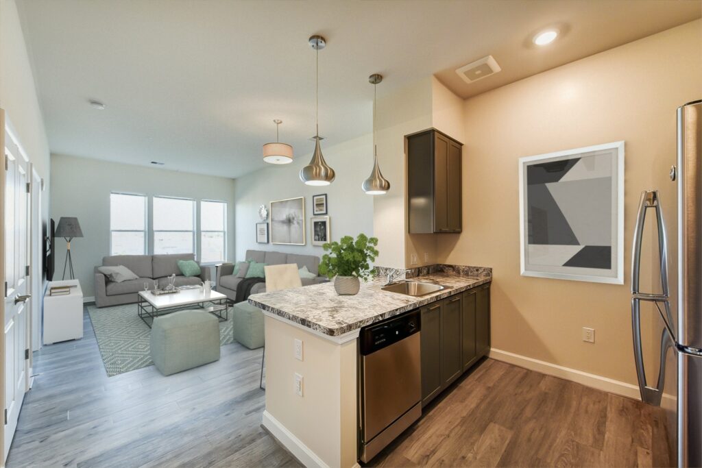 city view apartments kitchen with stainless steel appliances and view of living area with sofa, coffee table, modern lighting and large windows