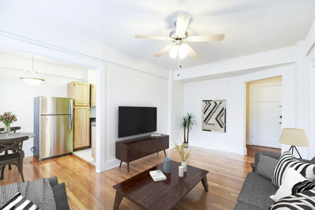 living area at wakefield hall apartments with hardwood flooring, stainless steel appliances and ceiling fan in washington dc