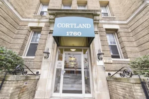 entrance and awning of the cortland apartment building in washington dc