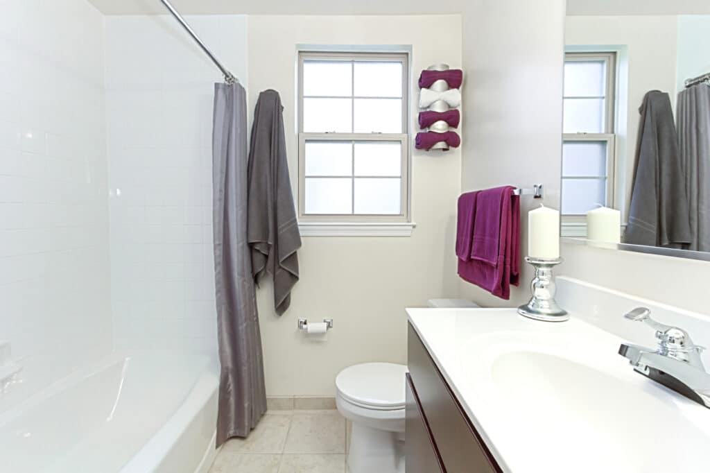 bathroom with tub, shower, toilet, sink and vanity at fairway park apartments in washington dc