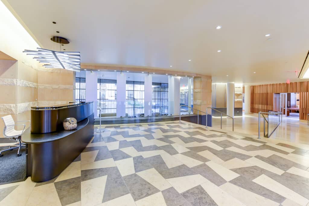 lobby with concierge desk at park chelsea apartments in washington dc
