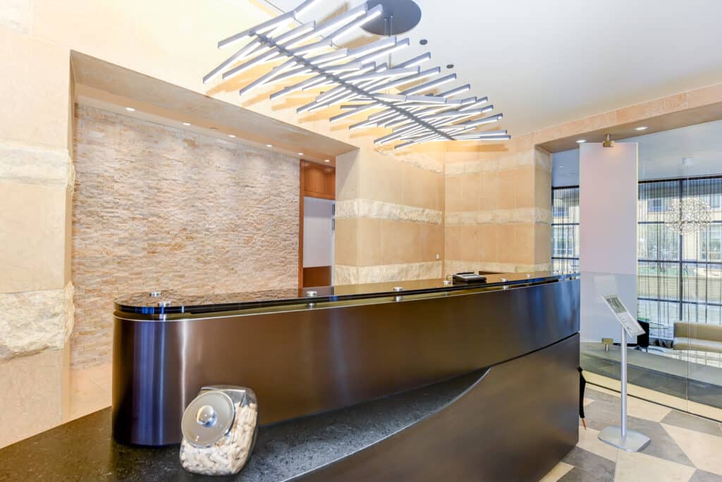 concierge desk in the lobby at park chelsea apartments in washington dc
