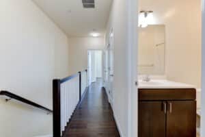 hallway view of bedrooms and upstairs bathroom at sheridan station south townhome apartments in washington dc