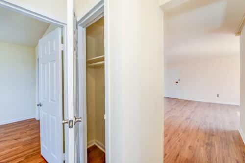 hallway view of closet, living area and bedroom at new horizon apartments in skyland washington dc